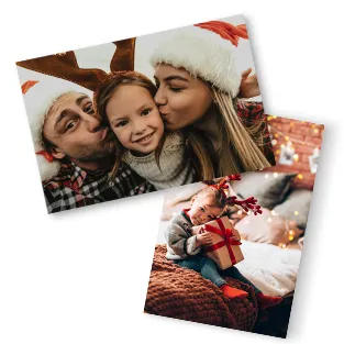 Zwei Premium Fotoabzüge mit weihnachtlichen Familienfotos